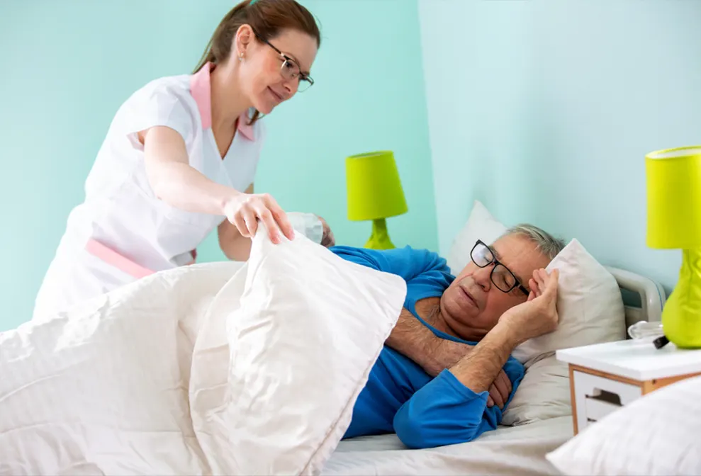 Night shift care staff in London – night carer assisting resident